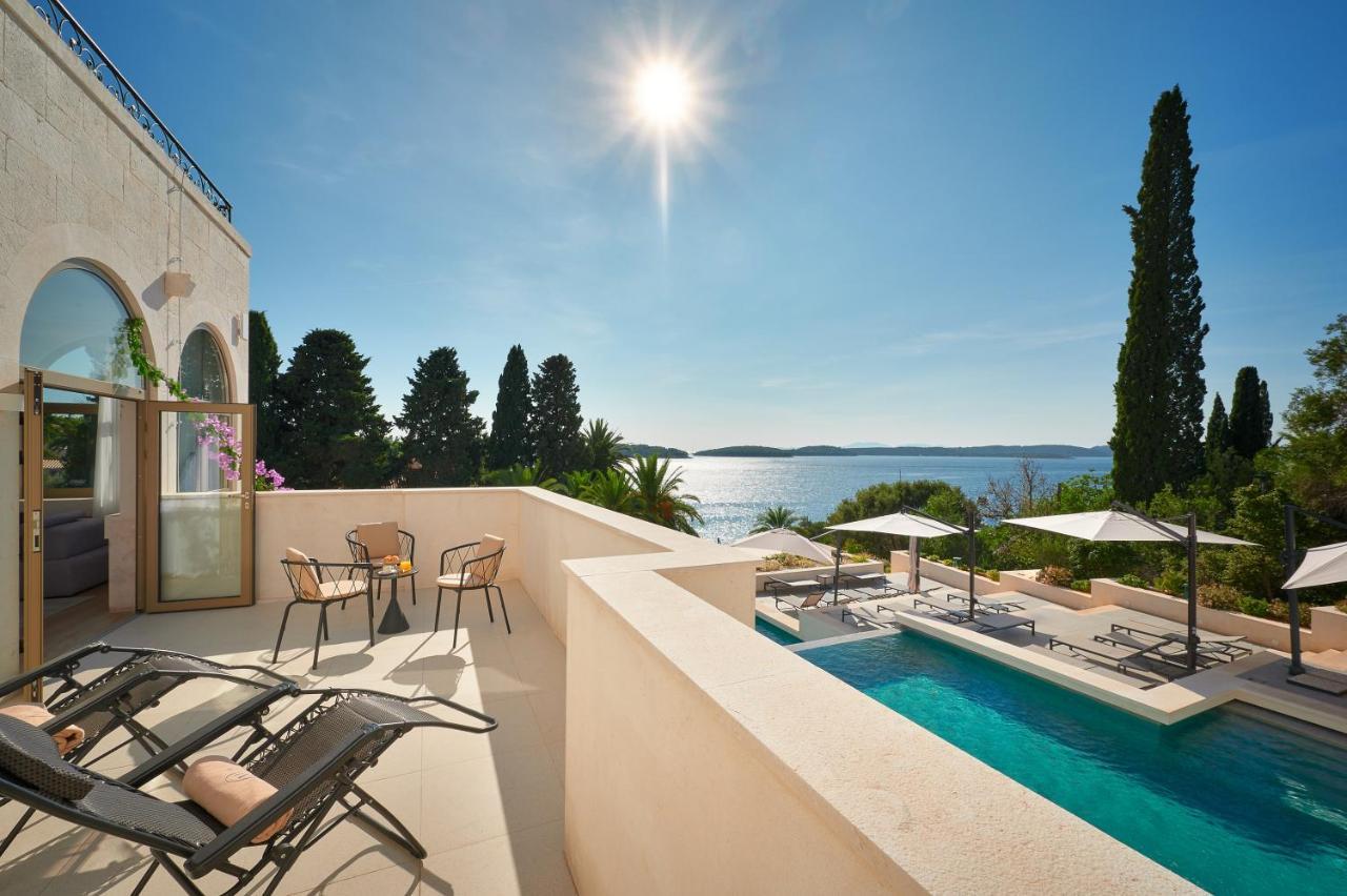 Suíte executiva com terraço e vista do mar e da piscina - Térreo